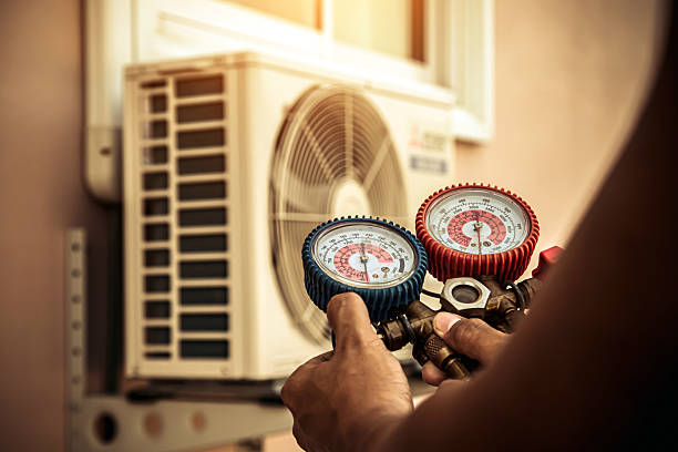 Professional Air Conditioning Service technician working in Cecil, PA